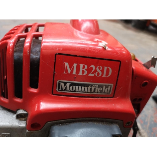 649 - A Mountfield MB28D petrol strimmer