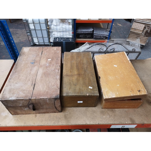 651 - Three mid 20th century wooden tool boxes, one containing Black & Decker sanding discs and cutting di... 