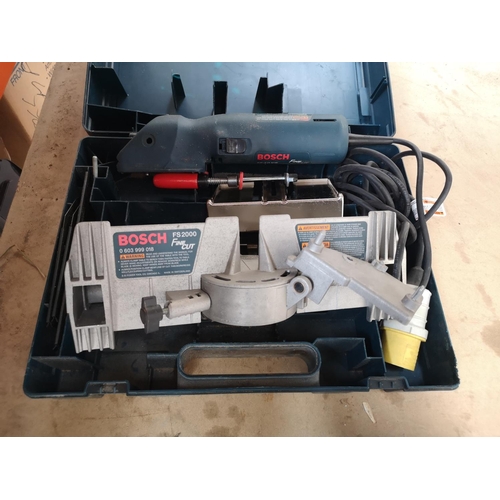 655 - A cased Bosch Fine Cut saw with attachments, one FS2000 and one 1640VS