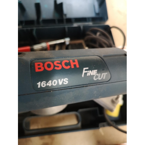 655 - A cased Bosch Fine Cut saw with attachments, one FS2000 and one 1640VS