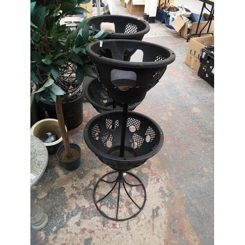 658 - A large collection of assorted garden equipment and accessories to include galvanised wheelbarrow, b... 