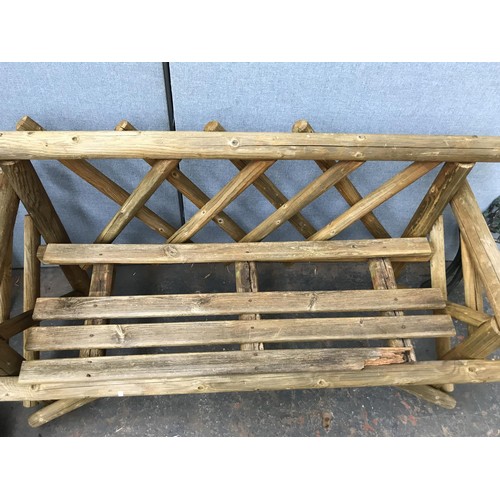 448 - Four garden related items, pine two seater bench, pair of cast iron bench ends, oak planter and set ... 