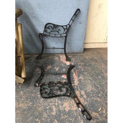 448 - Four garden related items, pine two seater bench, pair of cast iron bench ends, oak planter and set ... 