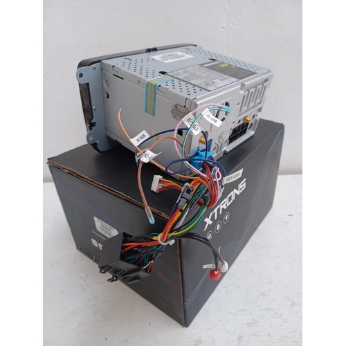 584 - A boxed Xtrons PF83MTVA Android in car entertainment system