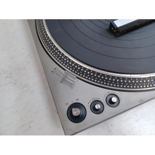 587 - A Technics SL-1700 two speed direct drive automatic turntable