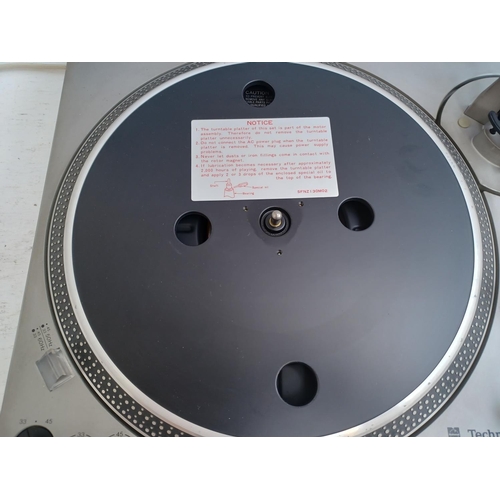587 - A Technics SL-1700 two speed direct drive automatic turntable