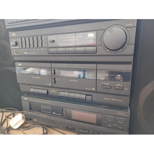 588 - A JVC hi-fi system comprising DR-E31LBK twin Dolby cassette deck/receiver, XL-ME91 six disc CD auto ... 