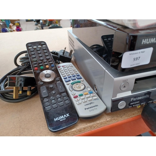 597 - Two items with remote controls and instruction manuals, one Panasonic DMR-EZ45V DVD recorder/VCR and... 