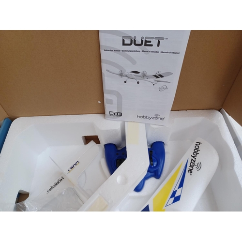 599 - A boxed Hobbyzone Duet radio controlled aircraft with remote control and instruction manual