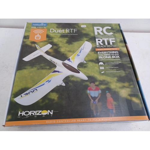 599 - A boxed Hobbyzone Duet radio controlled aircraft with remote control and instruction manual