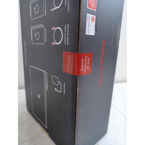 605 - A boxed and sealed Vodafone THG3000 WiFi hub