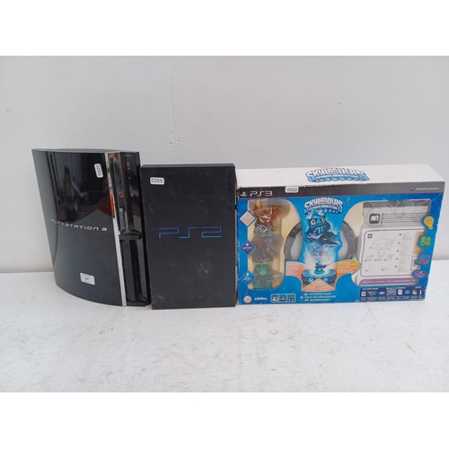 607 - Three items, one Sony PlayStation 3 console, one Sony PS2 console and one boxed Skylanders Spyro's A... 