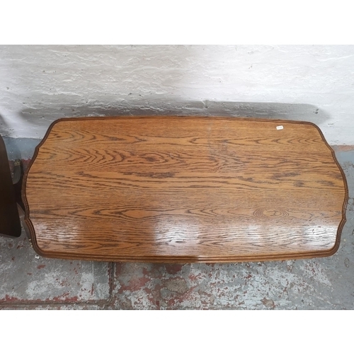 437 - Two pieces of furniture, one Regency style drop leaf side table with two drawers and brass lion paw ... 