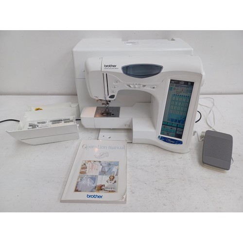 612 - A cased Brother Super Galaxie 3000D 107 pre-programme stitch sewing/embroidery machine with instruct... 