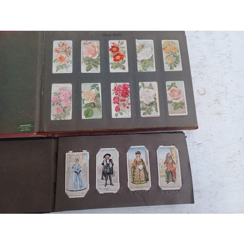 295 - A collection of vintage cigarette card albums to include Wills's Roses, Garden Life, Aviation, Crick... 