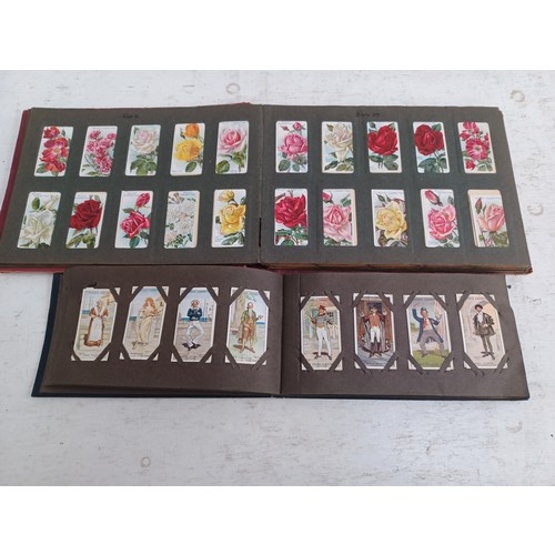 295 - A collection of vintage cigarette card albums to include Wills's Roses, Garden Life, Aviation, Crick... 