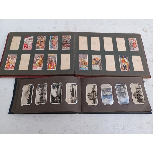 295 - A collection of vintage cigarette card albums to include Wills's Roses, Garden Life, Aviation, Crick... 