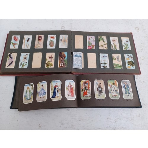 295 - A collection of vintage cigarette card albums to include Wills's Roses, Garden Life, Aviation, Crick... 