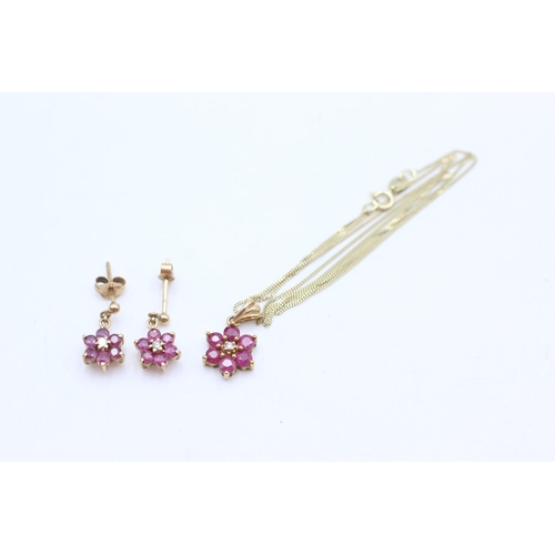 1001 - A 9ct gold ruby and diamond cluster pendant necklace and stud earrings set - approx. gross weight 3.... 