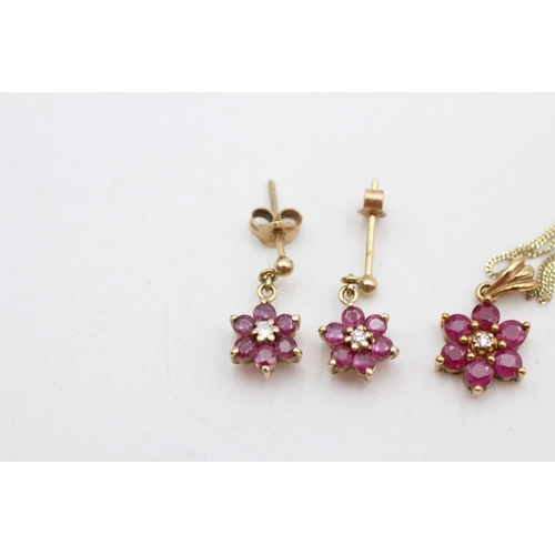 1001 - A 9ct gold ruby and diamond cluster pendant necklace and stud earrings set - approx. gross weight 3.... 