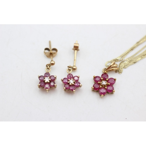 1001 - A 9ct gold ruby and diamond cluster pendant necklace and stud earrings set - approx. gross weight 3.... 