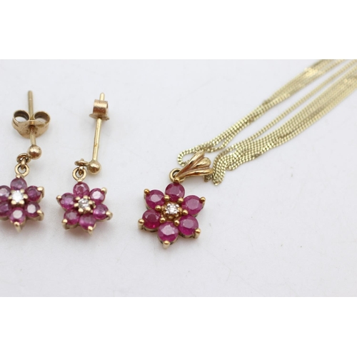 1001 - A 9ct gold ruby and diamond cluster pendant necklace and stud earrings set - approx. gross weight 3.... 