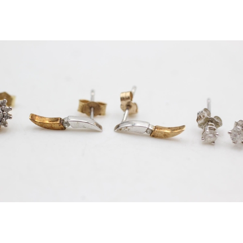 1004 - Three pairs of 9ct gold diamond stud earrings - approx. gross weight 2 grams