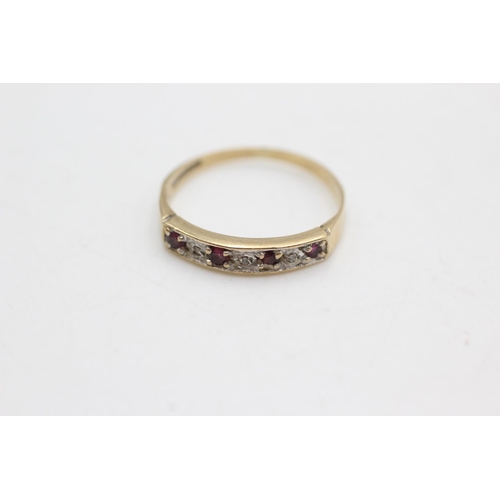 1005 - A 9ct gold diamond and ruby half eternity ring, size L½ - approx. gross weight 1.3 grams