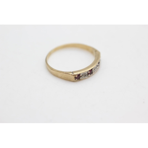 1005 - A 9ct gold diamond and ruby half eternity ring, size L½ - approx. gross weight 1.3 grams