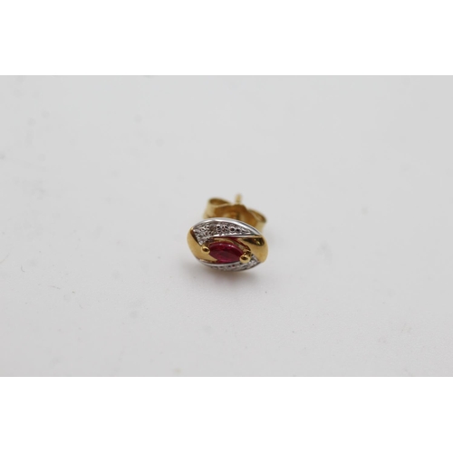 1009 - A pair of 9ct gold ruby and diamond stud earrings - approx. gross weight 0.9 grams