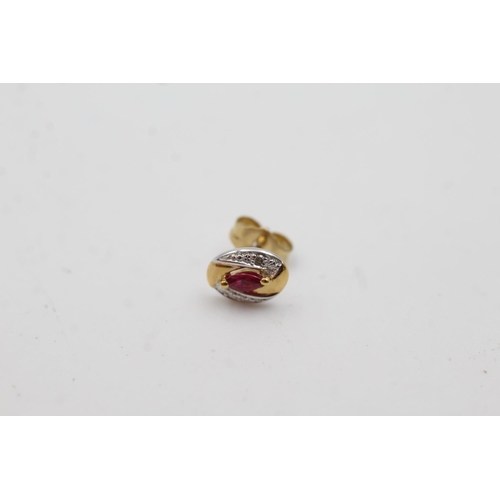 1009 - A pair of 9ct gold ruby and diamond stud earrings - approx. gross weight 0.9 grams