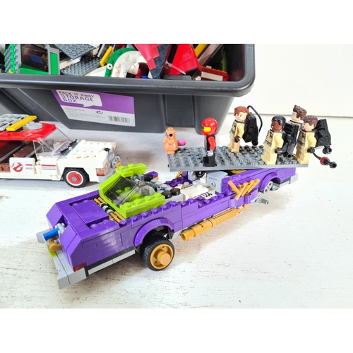 102A - A collection of Lego to include Ghostbusters figurines and vehicle etc.