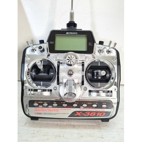 103 - A cased SPCM X-3810 radio control system with owner's manual