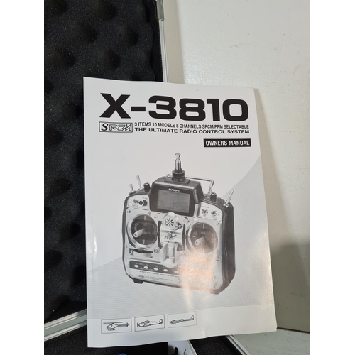 103 - A cased SPCM X-3810 radio control system with owner's manual