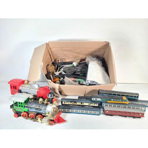 104 - A collection of assorted model railway accessories to include Tri-ang AR29-221 coach, Echo 80150 pla... 