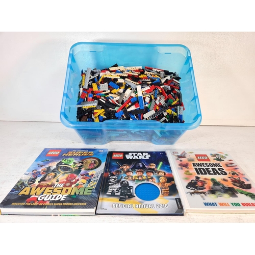 105 - A box containing assorted Lego and three guidebooks