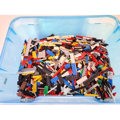 105 - A box containing assorted Lego and three guidebooks