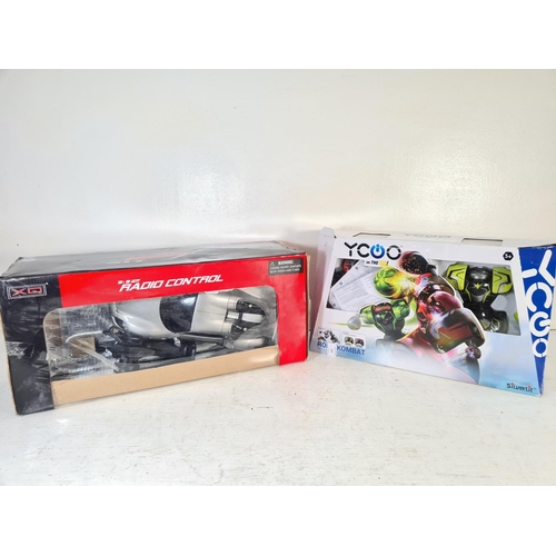 107 - Two boxed remote control toys, one XQ 1:12 scale Porsche 918 Spyder and one Silverlit Ycoo On The Go... 