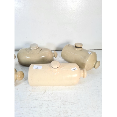 48 - Five vintage stoneware hot water bottles to include Bourne Denby, Pearson's of Chesterfield etc.