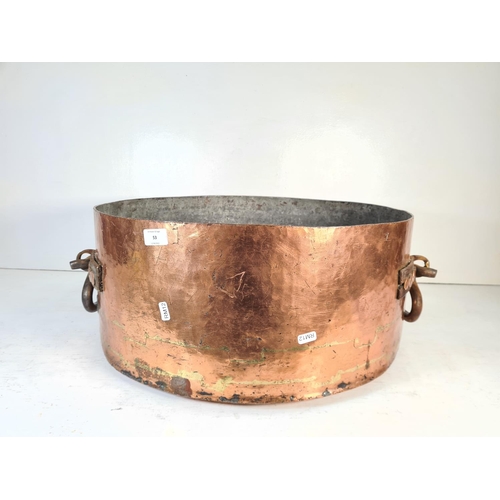 53 - A 19th century Moresi & Lucca Coppersmiths heavy copper twin handled cooking pot - approx. 25cm high... 