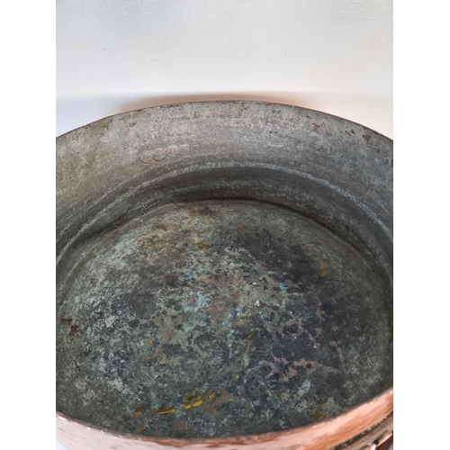 53 - A 19th century Moresi & Lucca Coppersmiths heavy copper twin handled cooking pot - approx. 25cm high... 