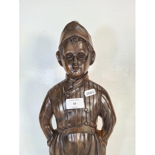 59 - A cast metal novelty boy companion set holder - approx. 52cm high