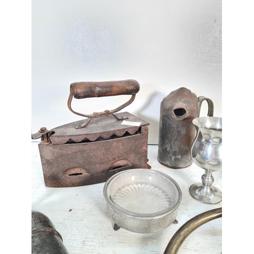 64A - A collection of vintage metalware to include Desmo Ltd. of Birmingham car horn, cast iron flat iron,... 