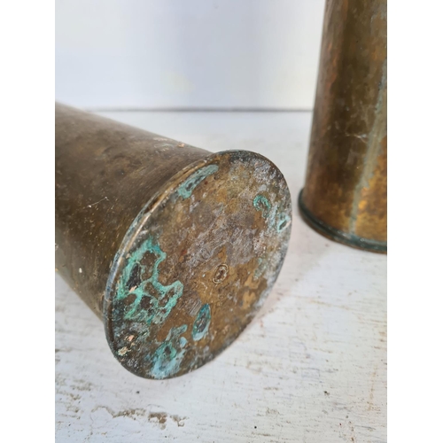 69 - Two brass shell cases, one WWI dated 1917 and one WWII dated 1942 - largest approx. 29cm high