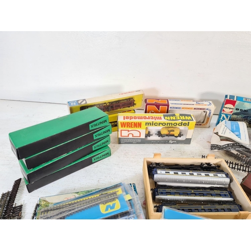 72 - A collection of assorted N gauge model railway accessories to include boxed Wrenn micromodel 201 die... 