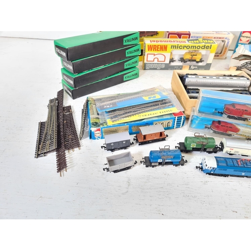 72 - A collection of assorted N gauge model railway accessories to include boxed Wrenn micromodel 201 die... 