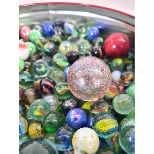 73 - A large collection of glass marbles