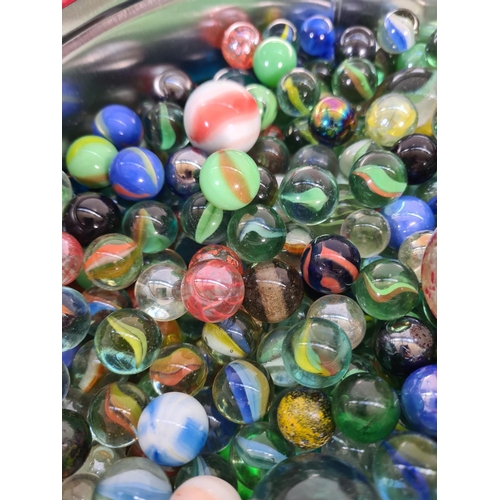 73 - A large collection of glass marbles