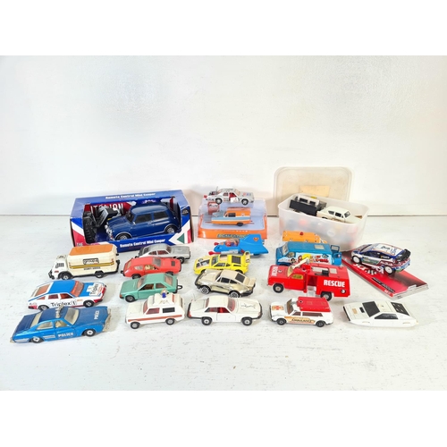 74 - A collection of assorted model vehicles to include Saico Ford Anglia, SCX Ford Fiesta WRC, boxed Sca... 