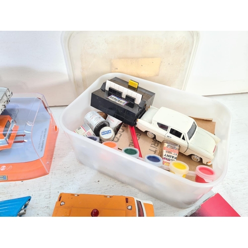 74 - A collection of assorted model vehicles to include Saico Ford Anglia, SCX Ford Fiesta WRC, boxed Sca... 